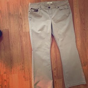 Khaki bootcut pants.